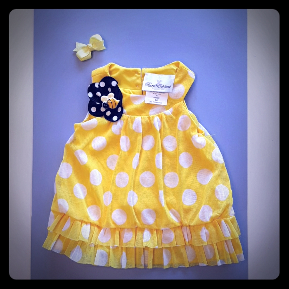 New dress with hair bow.